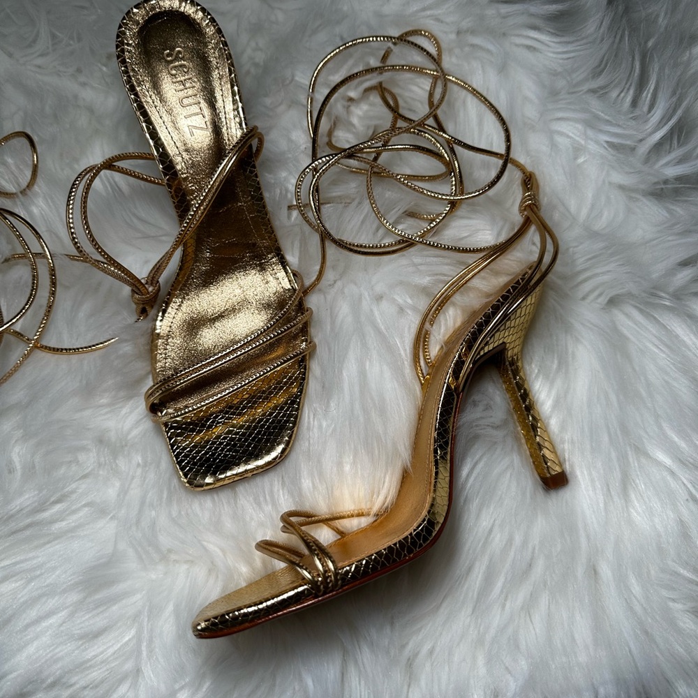 New Schutz gold gladiator heels